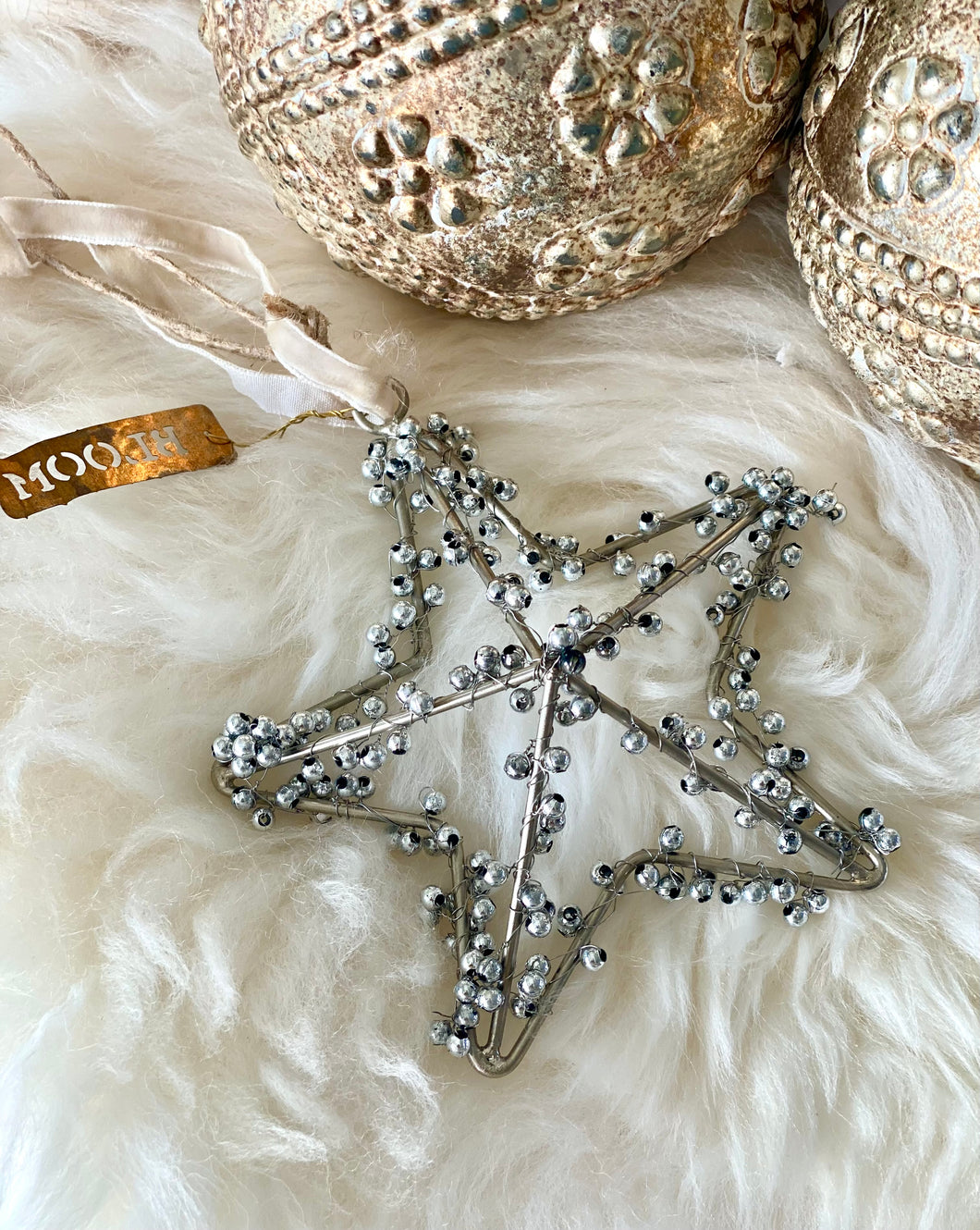 Étoile métallique grelots PM 10cm