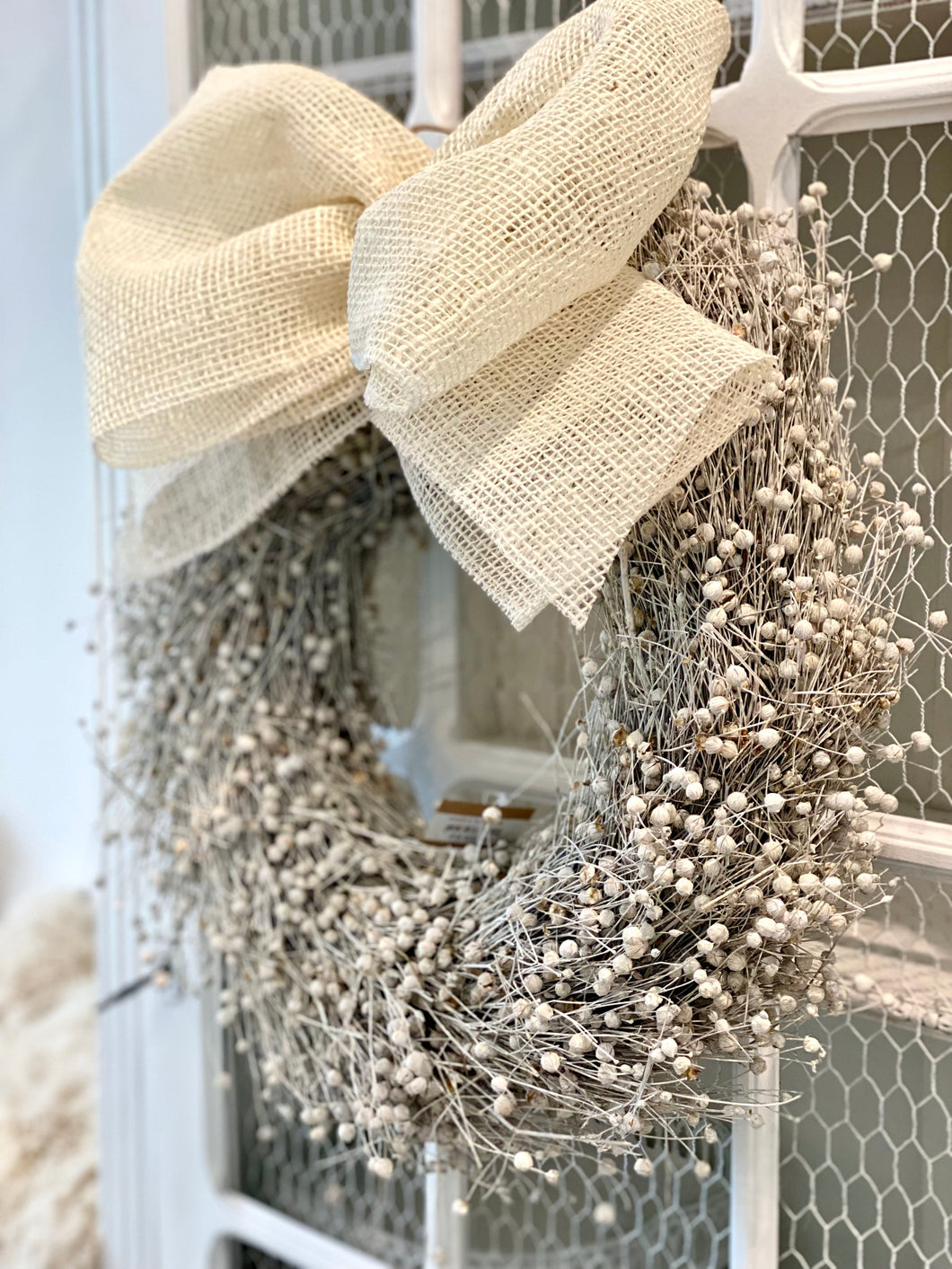 Couronne fleurs de lin blanchie 35cm avec noeud